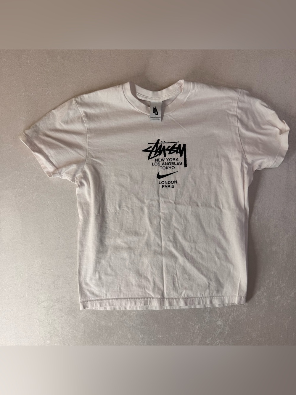 White Nike X Stussy International Tee Features A Graphic Listing Global Cities View 3